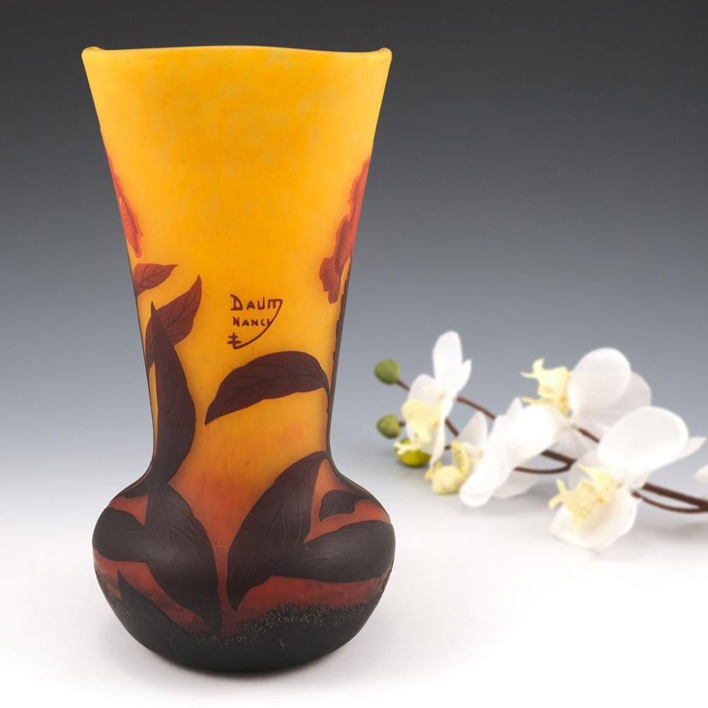 A Daum Vase With Bearded Irises, c1910

Additional Information:
Heading : Daum Nancy Irises cameo vase
Date : c1910
Origin : Nancy, France
Colour : Amber and orange with two shades of burgundy depicting bearded irises. 
Bowl : Tapered with bulbous