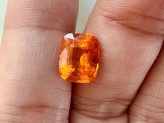 A Dazzling Fanta orange, reminiscent of sunlit 3.57 carat Mandarin Garnet.