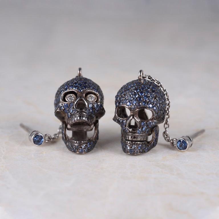 DEAKIN & FRANCIS, Piccadilly Arcade, London

Our trademark skull collection continues to expand. These limited edition stunning 18kt gold, sapphire skull earrings are definitely jaw dropping, literally. When you pull the jaw down it reveals dazzling