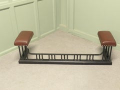 A Deco Heavy Iron and Tan Leather Club Fender This is an attractive piece