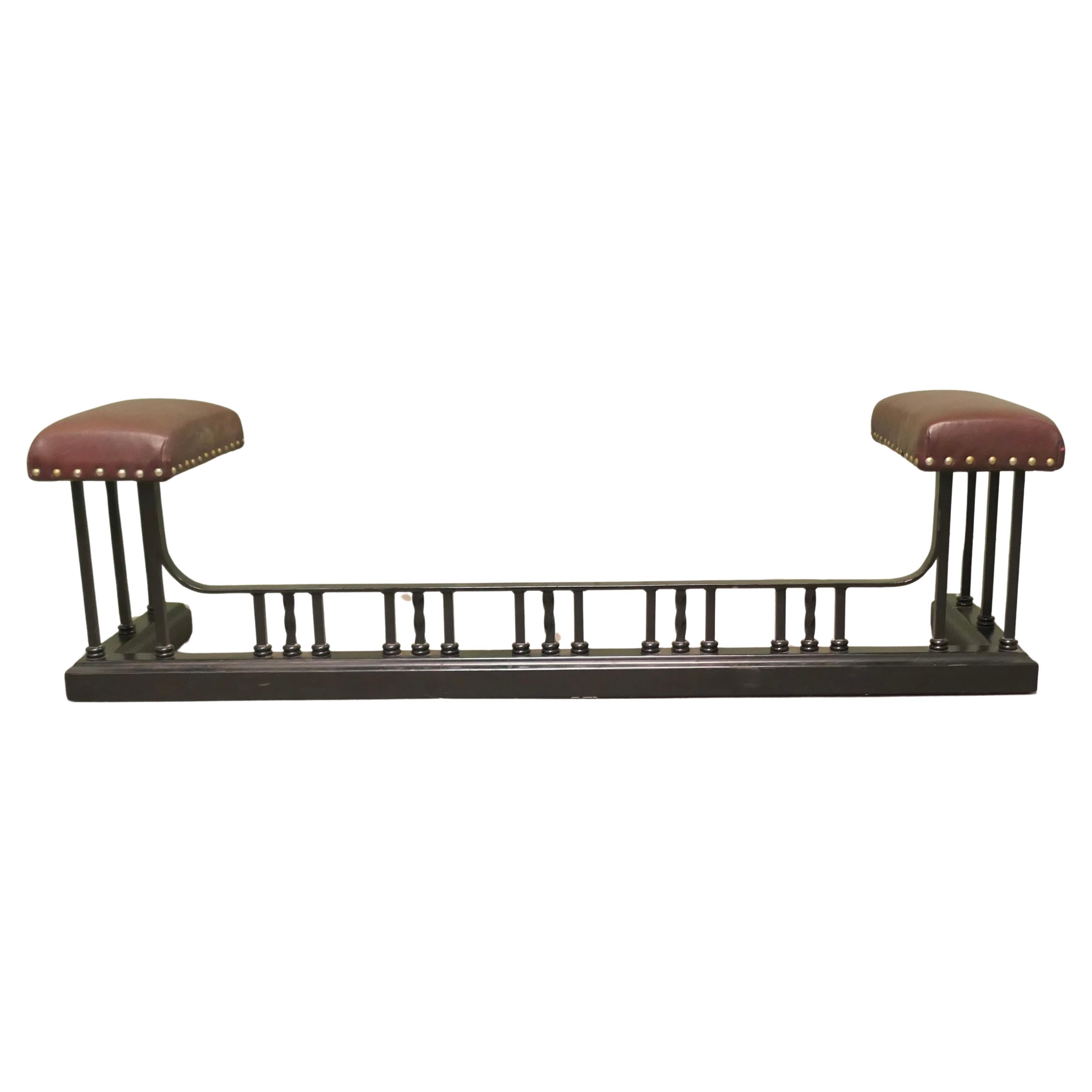 A Deco Heavy Iron and Tan Leather Club Fender This is an attractive piece