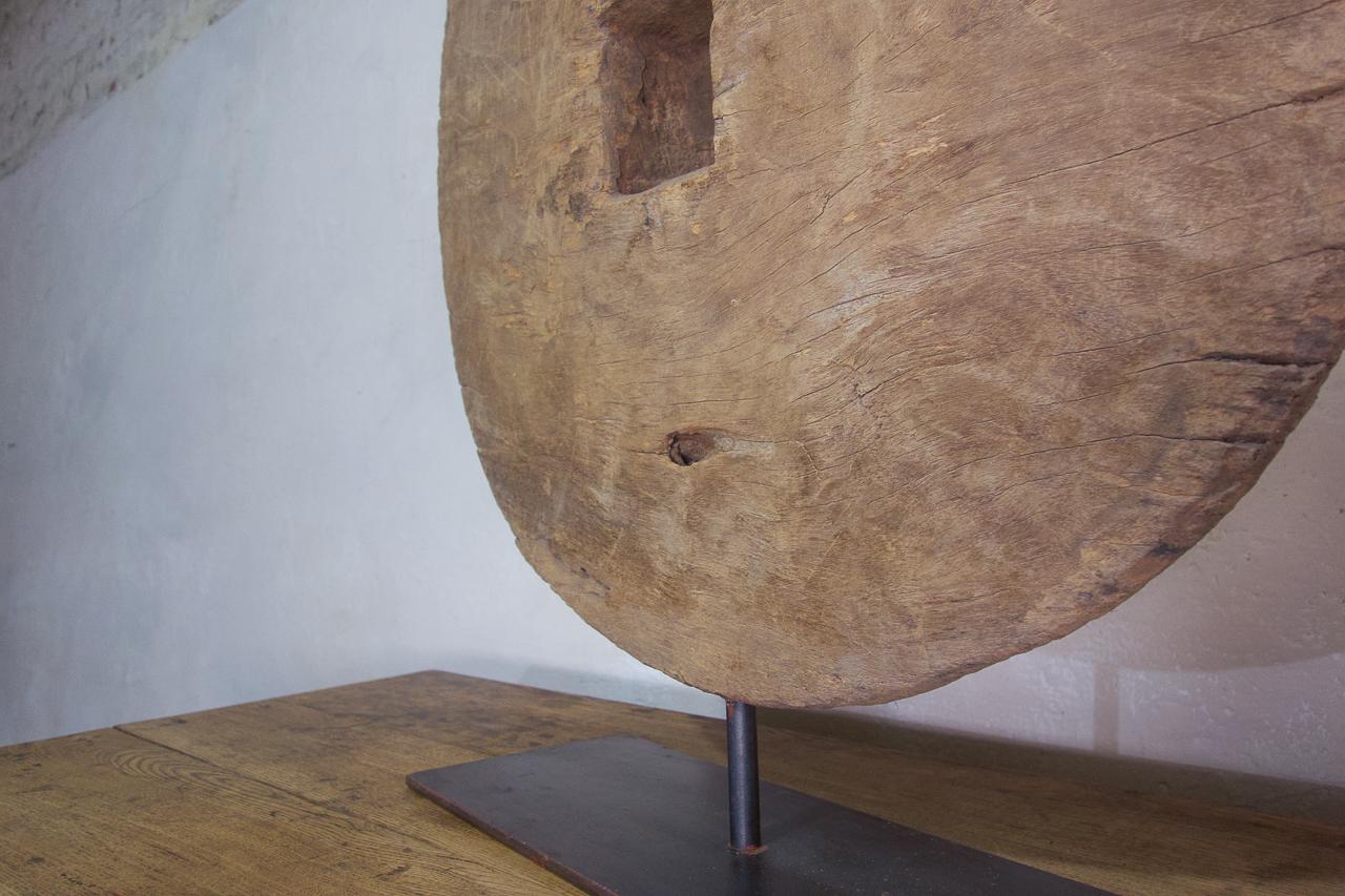 Asian 18th Century Ox Wheel Mounted On Stand For Sale