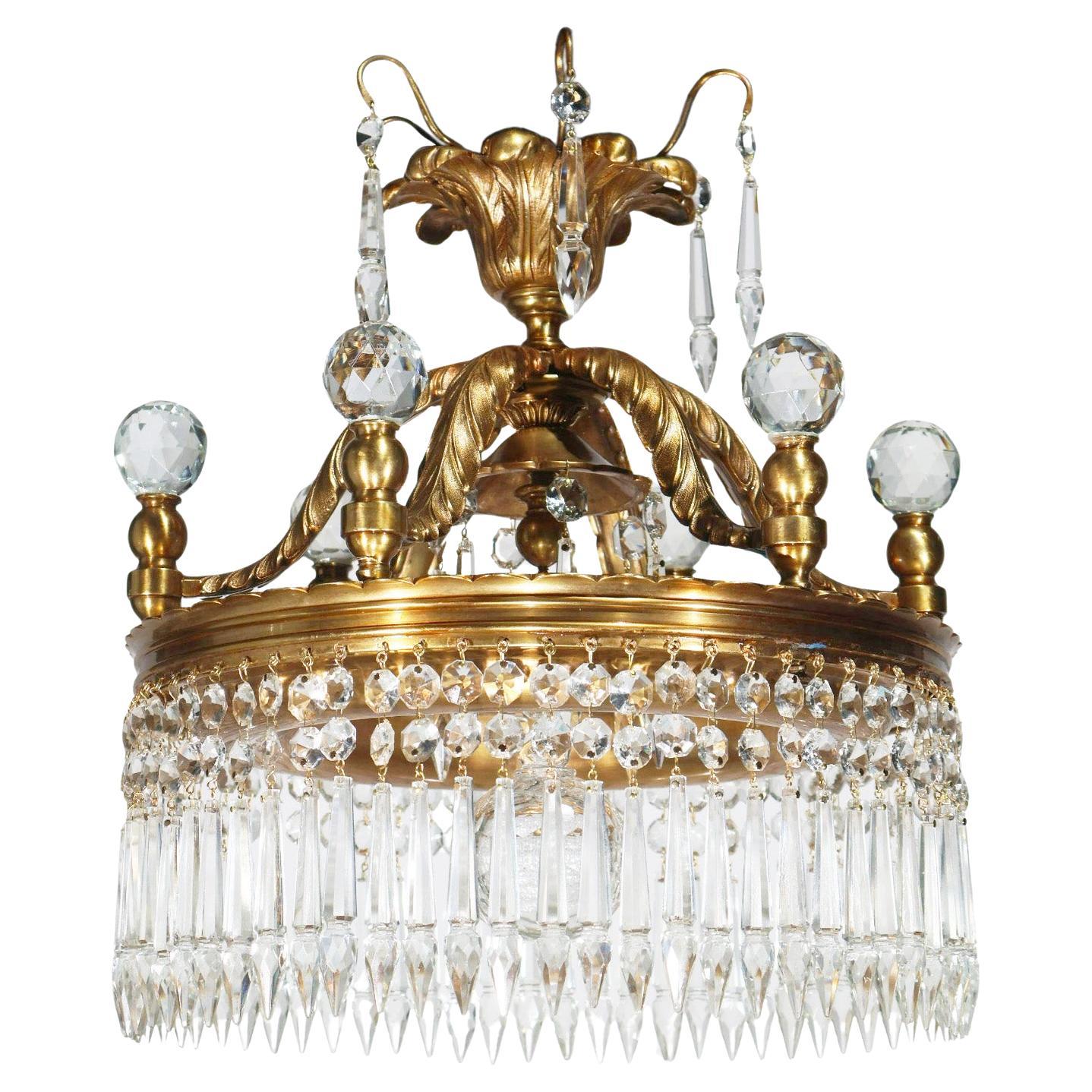A Decorative Chandelier for indirect light in the Louis XVI style.