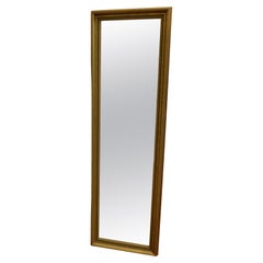 Long miroir décoratif doré/vert à habillage