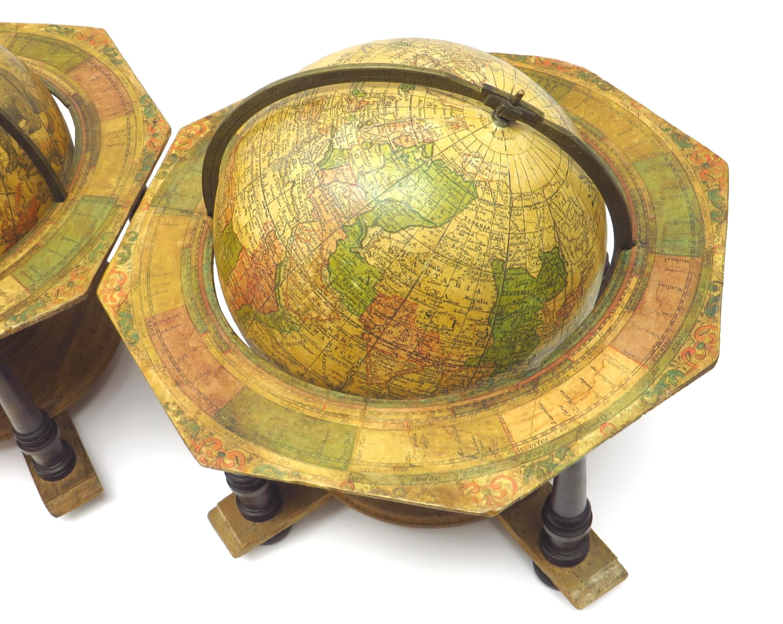 A decorative pair of rare table globes in a fine condition. In Excellent Condition For Sale In ZWIJNDRECHT, NL