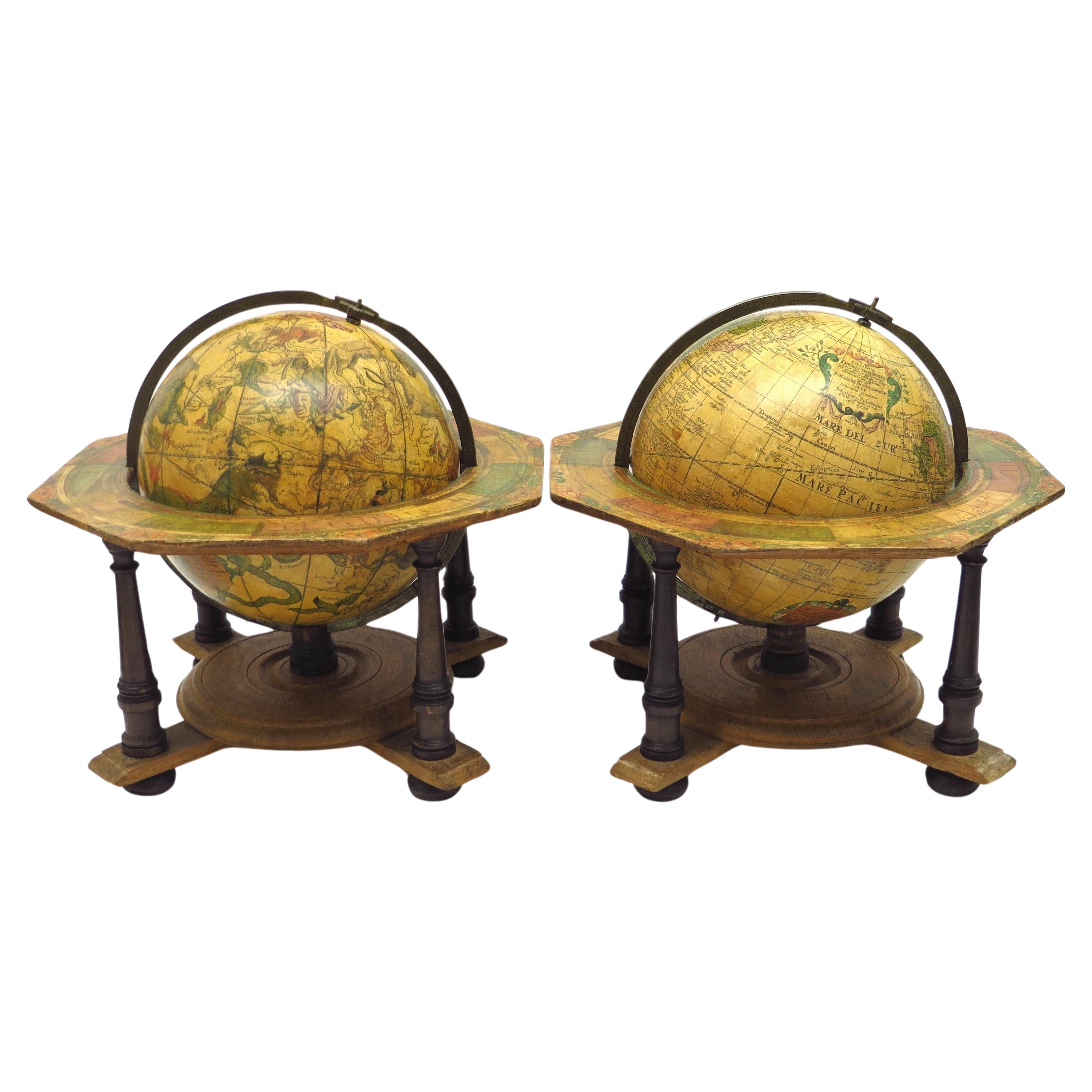 A decorative pair of rare table globes in a fine condition. For Sale