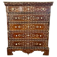 A decorative Syrian inlaid five drawer commode with Carrera marble top