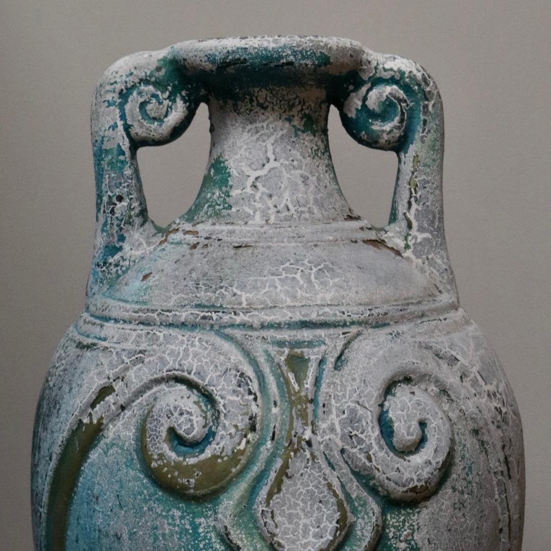 Victorino is a beautiful terracotta vessel in timeworn hues of alabaster and turquoise featuring a unique raised decorative pattern and small spiral handles. An excellent example of the burnished pottery technique

Discovered in an abandoned potters