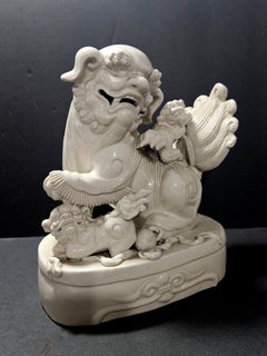 A Dehua Blanc de Chine Figure of a Buddhist Lion and 2 Cubs – 18/19th Century