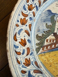 A Delft Polychrome Earthenware Plate, 18th Century
