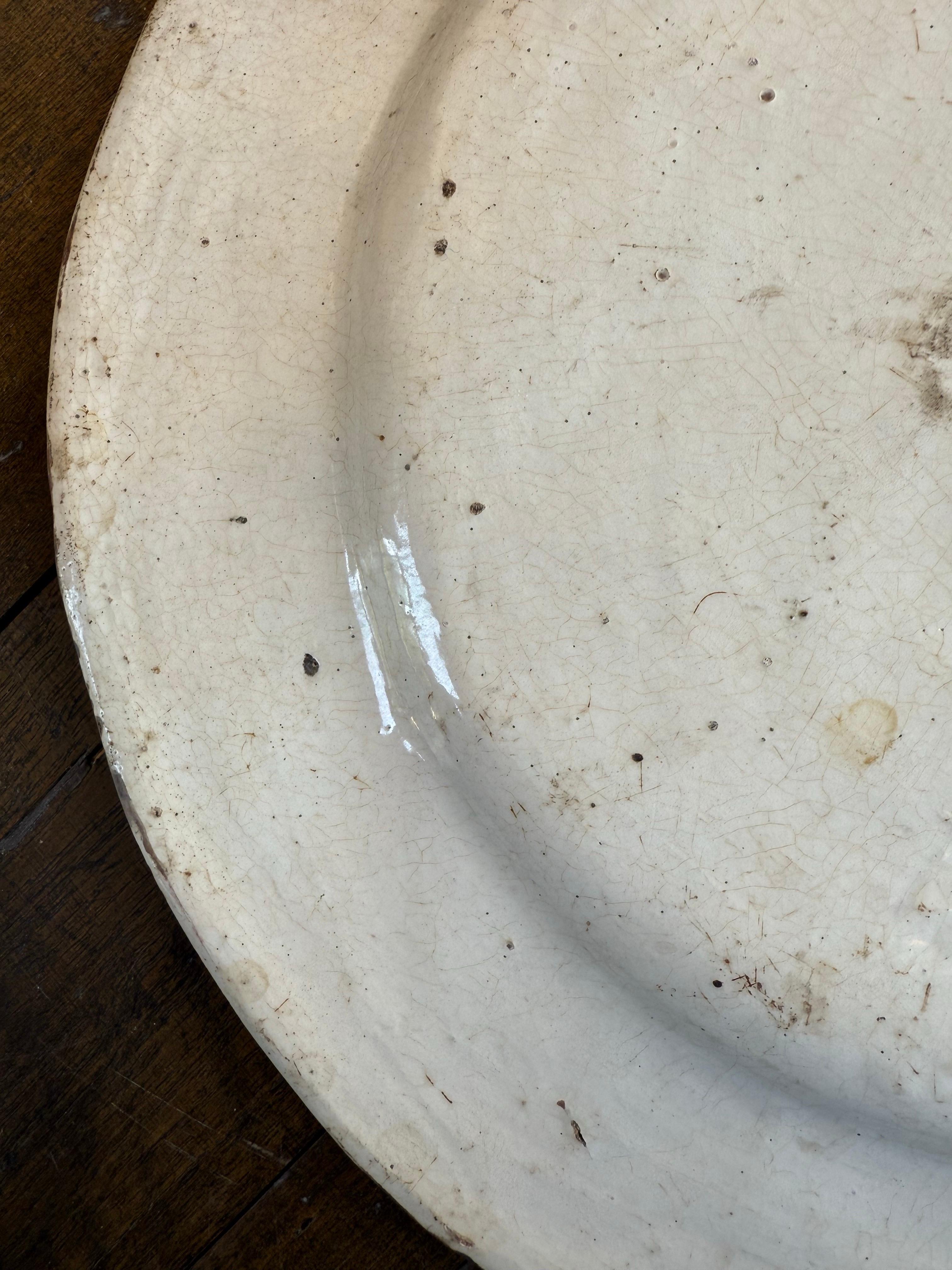 18th Century and Earlier A Delft Polychrome Earthenware Plate, 18th Century For Sale