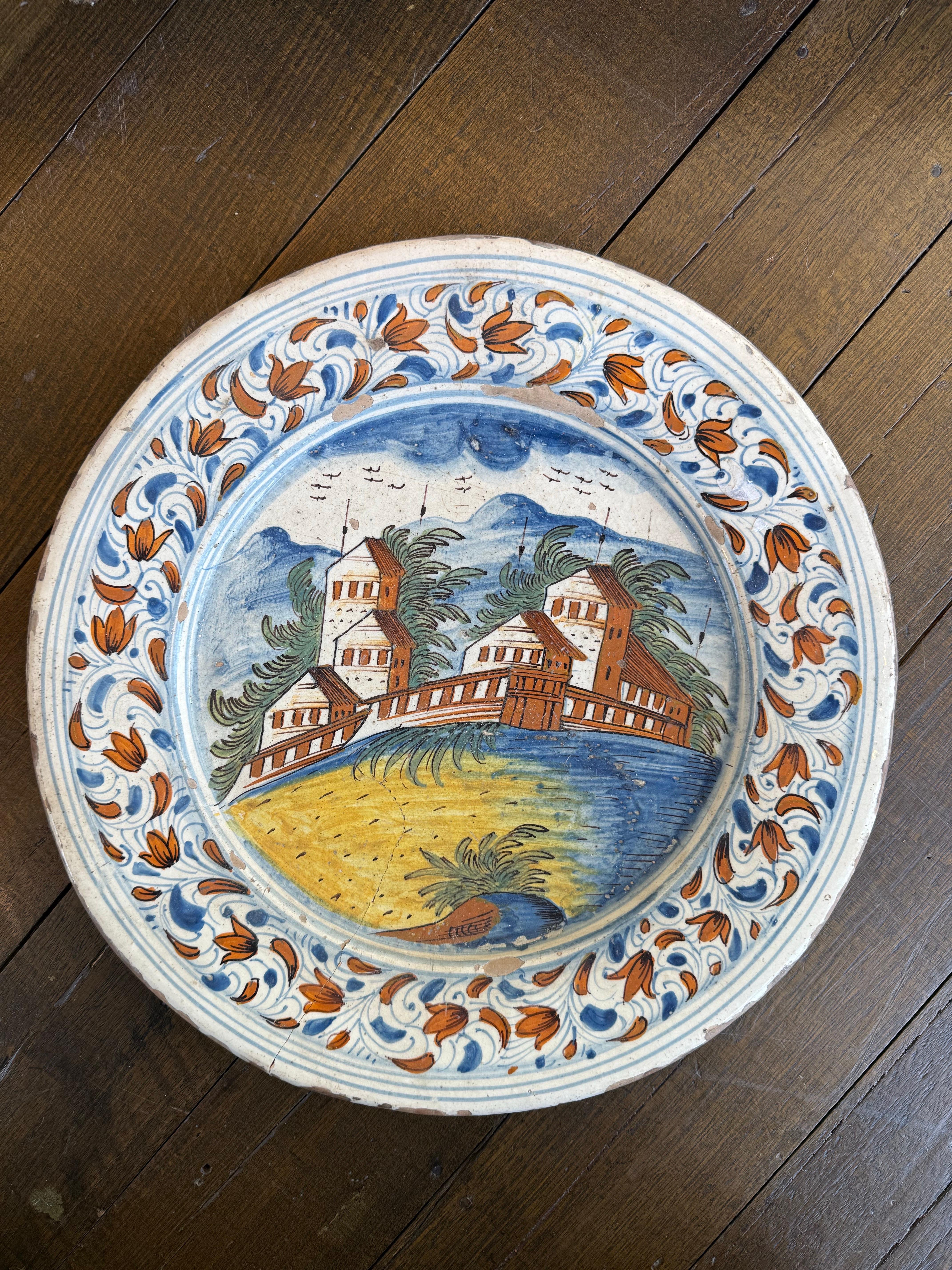 A Delft Polychrome Earthenware Plate, 18th Century For Sale 1