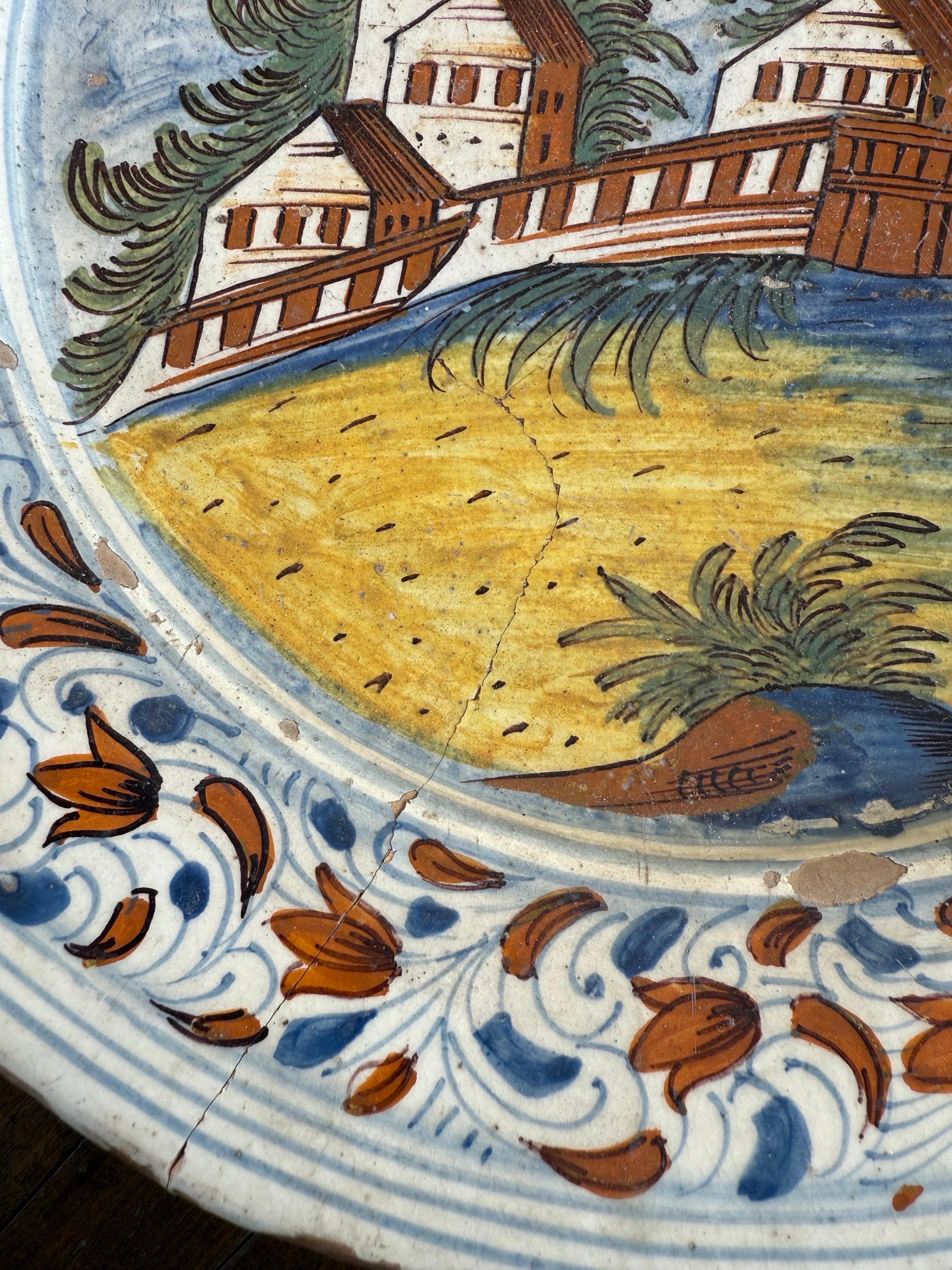A Delft Polychrome Earthenware Plate, 18th Century For Sale 2