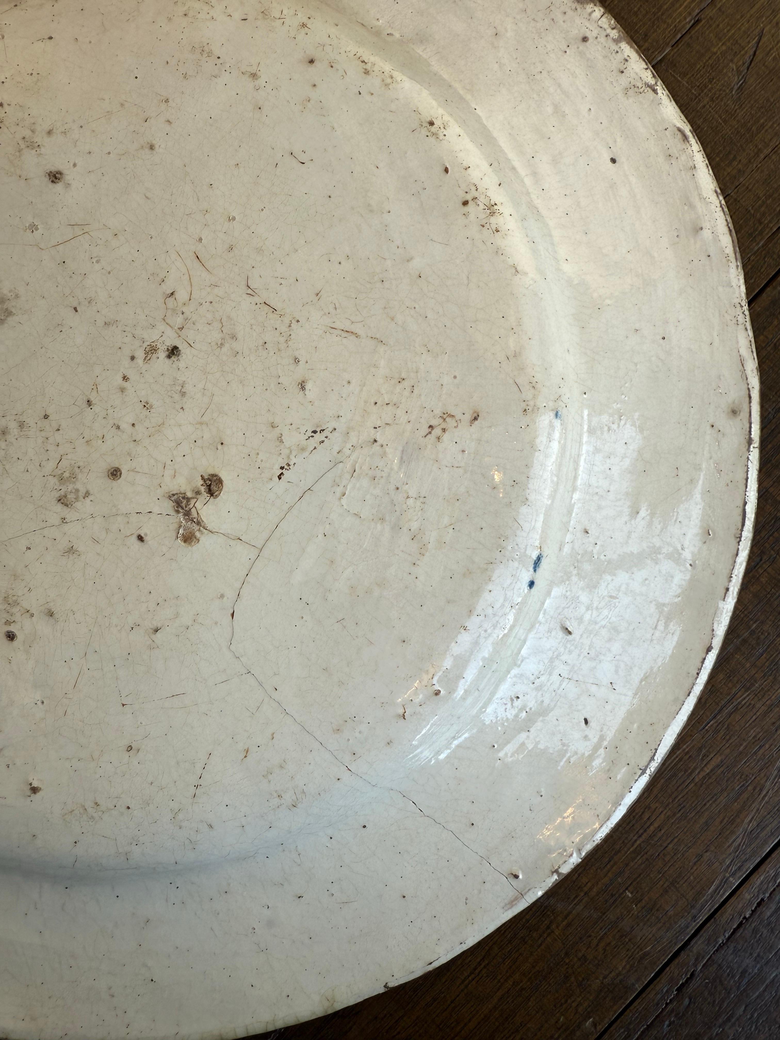 A Delft Polychrome Earthenware Plate, 18th Century For Sale 3