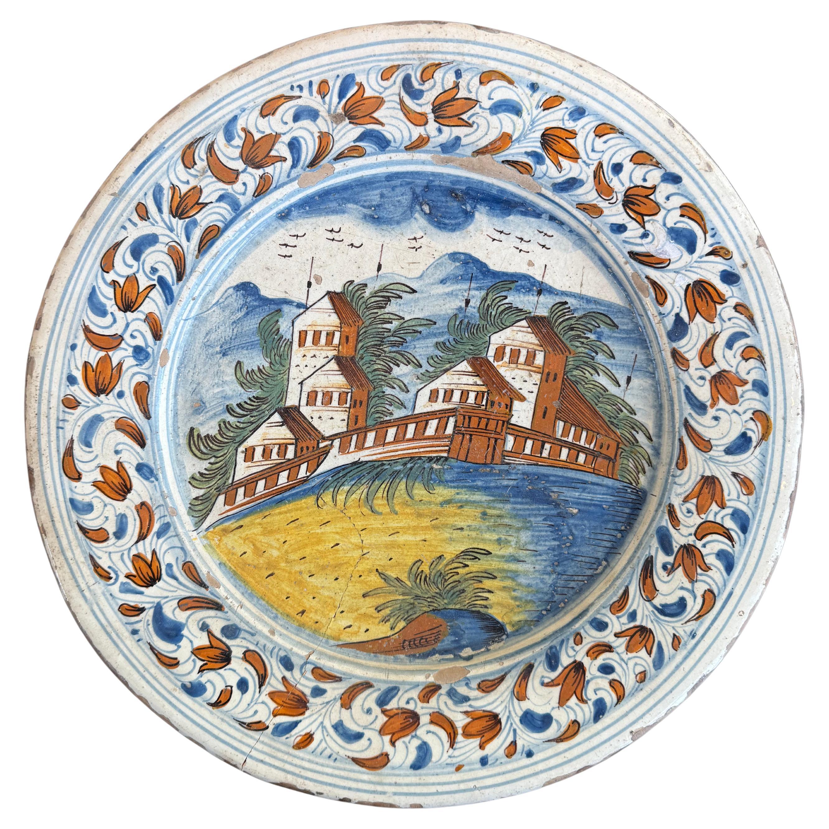 A Delft Polychrome Earthenware Plate, 18th Century For Sale