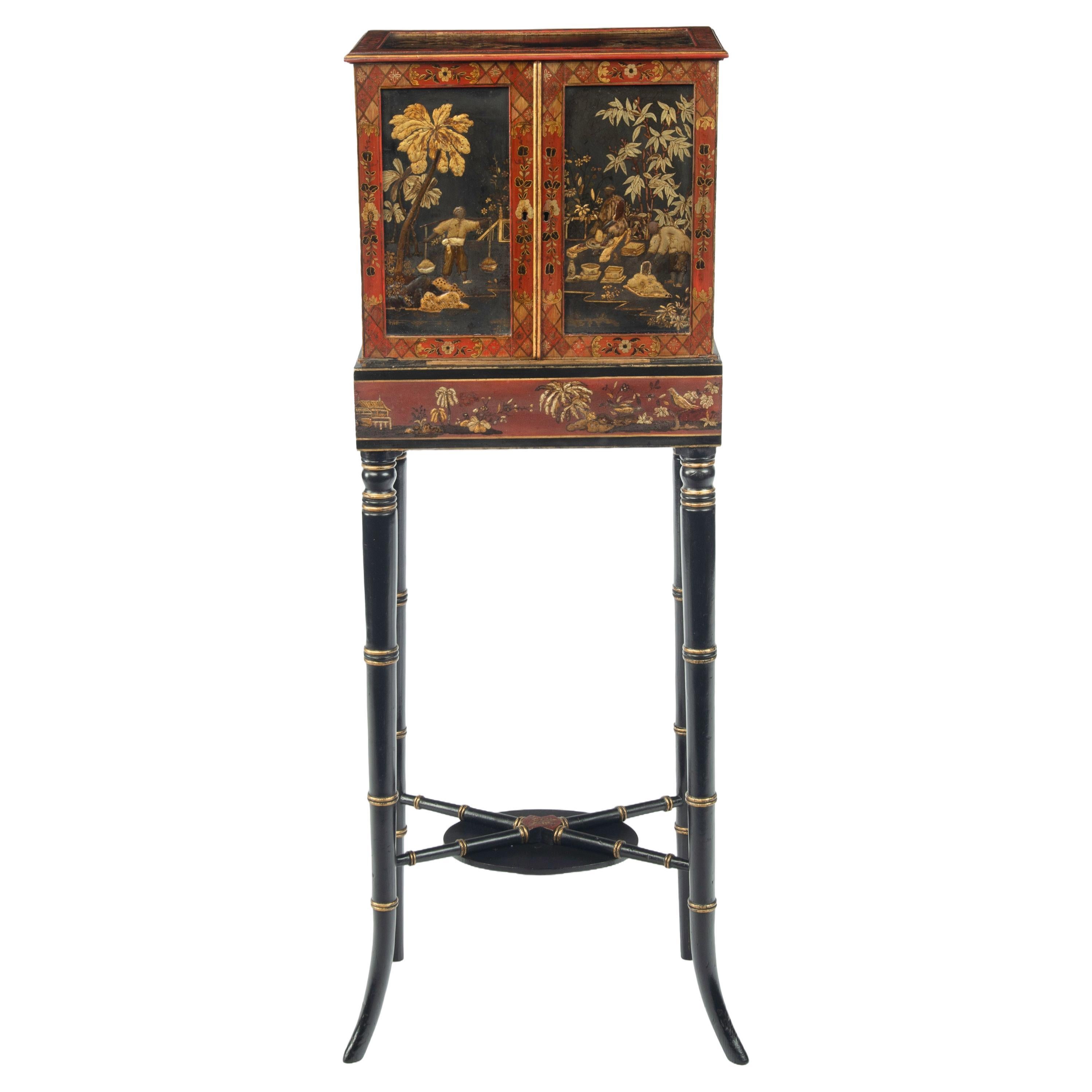 A delicate Regency Chinoiserie lacquer cabinet For Sale