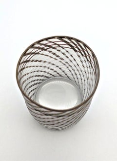 A delicately painted cup vase by Isgard Moje-Wohlgemuth, made 1993