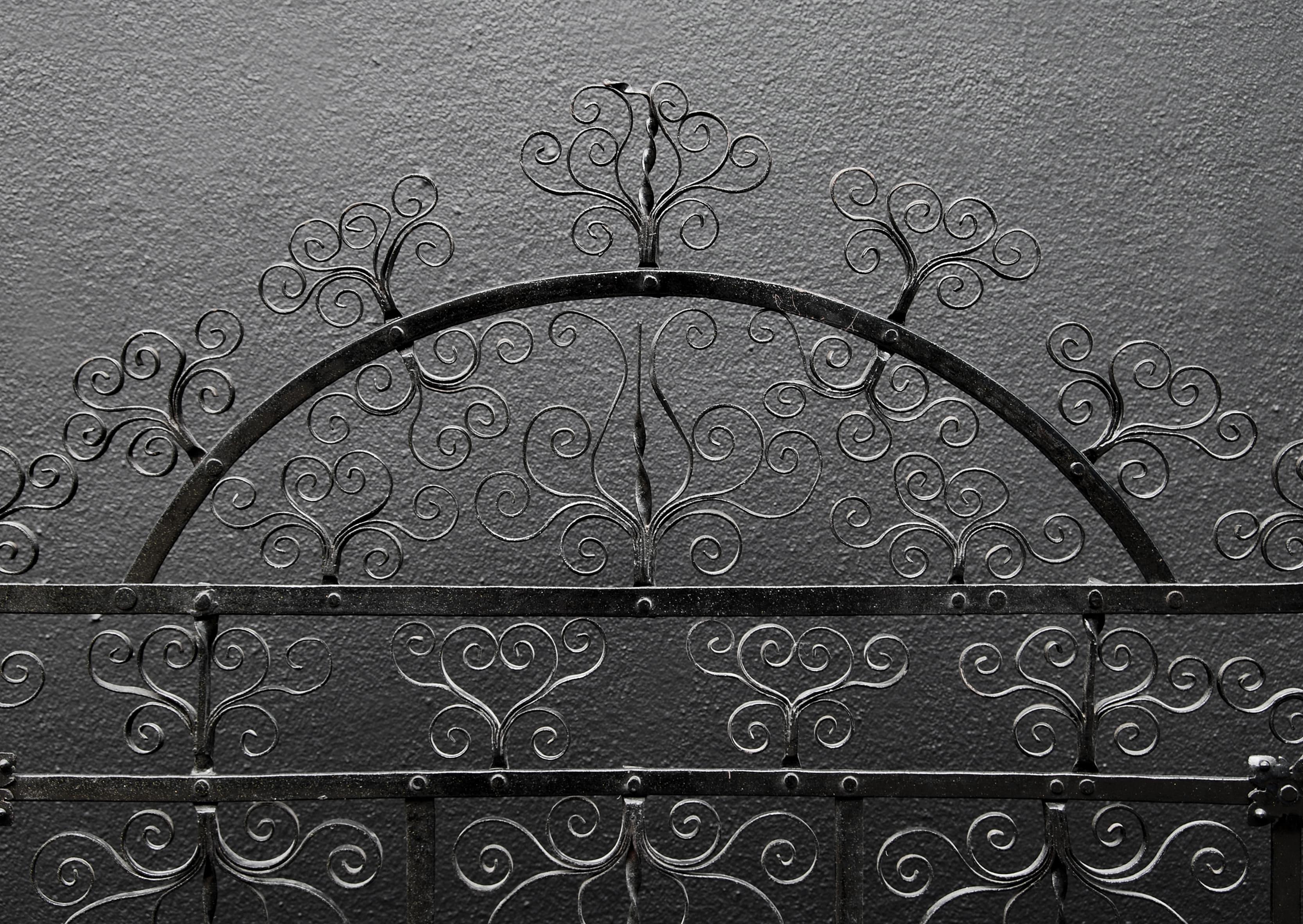 20th Century Delicately Scrolled Wrought Iron Firescreen For Sale