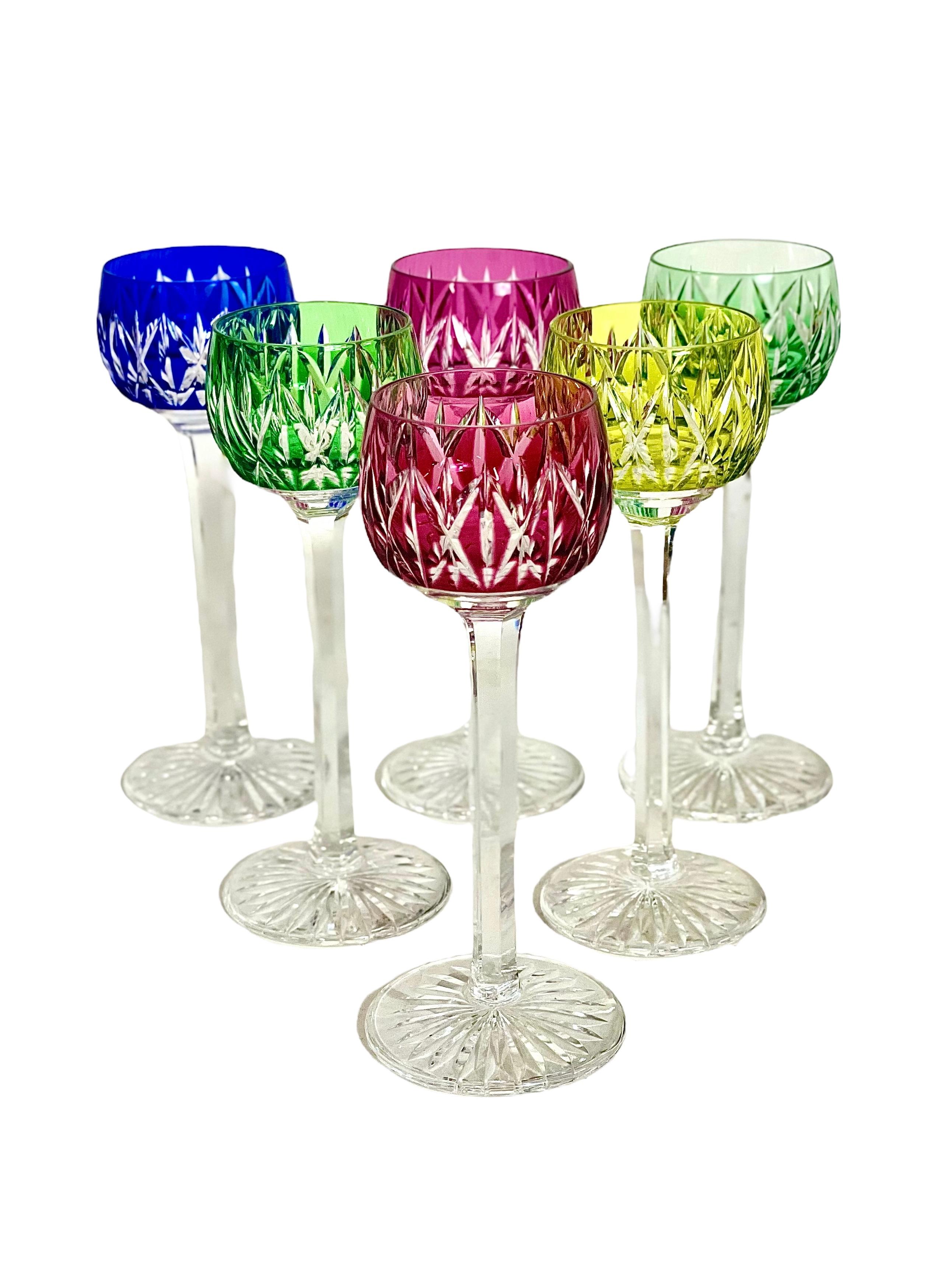 A delightful set of six multi-coloured liqueur glasses in double-layer crystal made by the celebrated Compagnie des Cristalleries de Saint Louis in Lorraine, the oldest glass manufacturer in France, dating back to 1586. Mouth-blown and hand-cut,