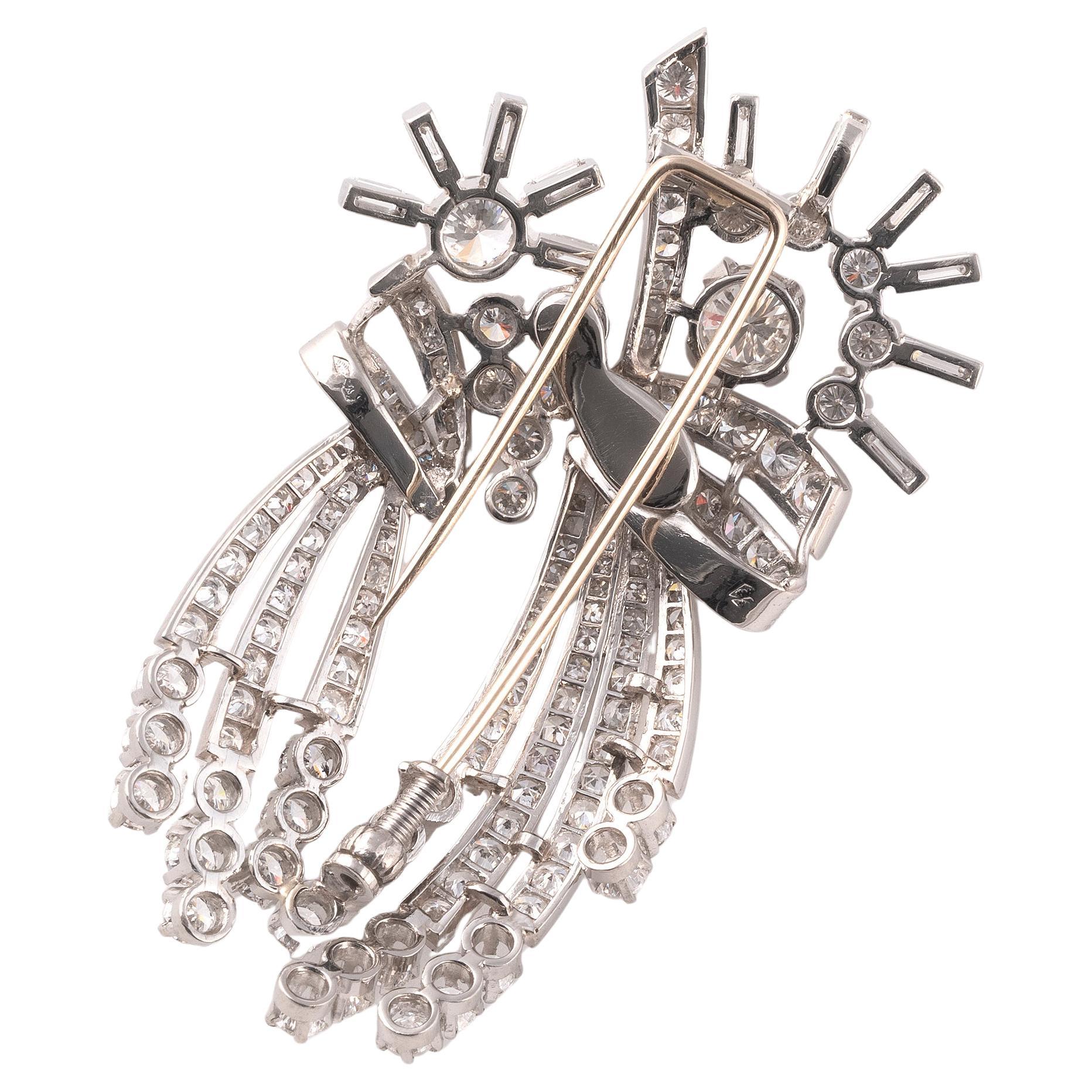 Dimensioni: Spilla/pendente in diamanti e platino, circa 1950. Peso lordo: 27,26 gr. Dimensioni: 6 x 3,5 cm.
Circa 6ct di diamante
Nome dell'artista: Travail Francais - Periodo: 1950


