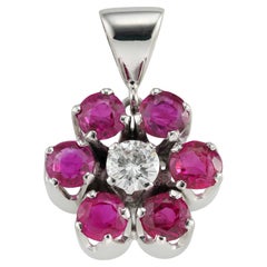 A Diamond And Ruby Cluster Pendant