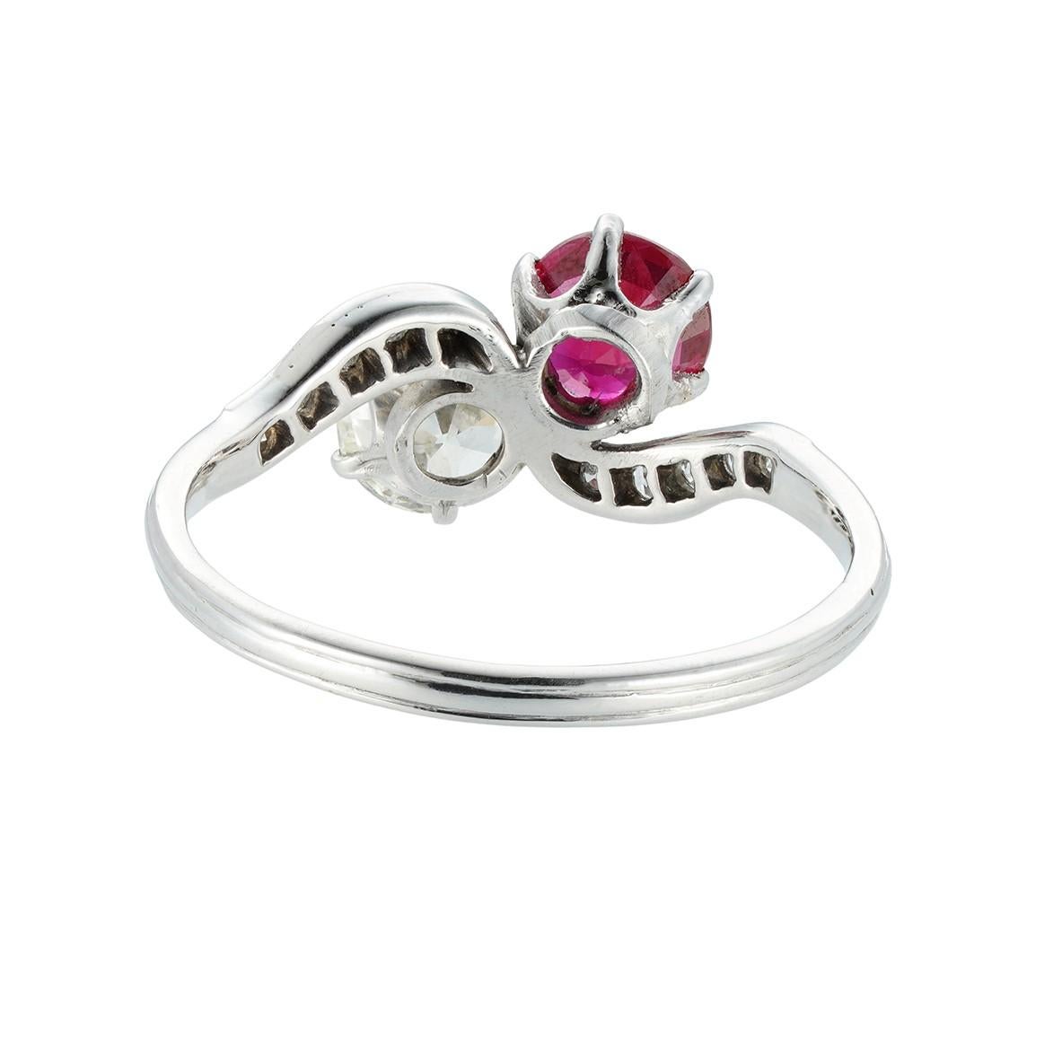 Modern Diamond and Ruby Cross-Over Ring