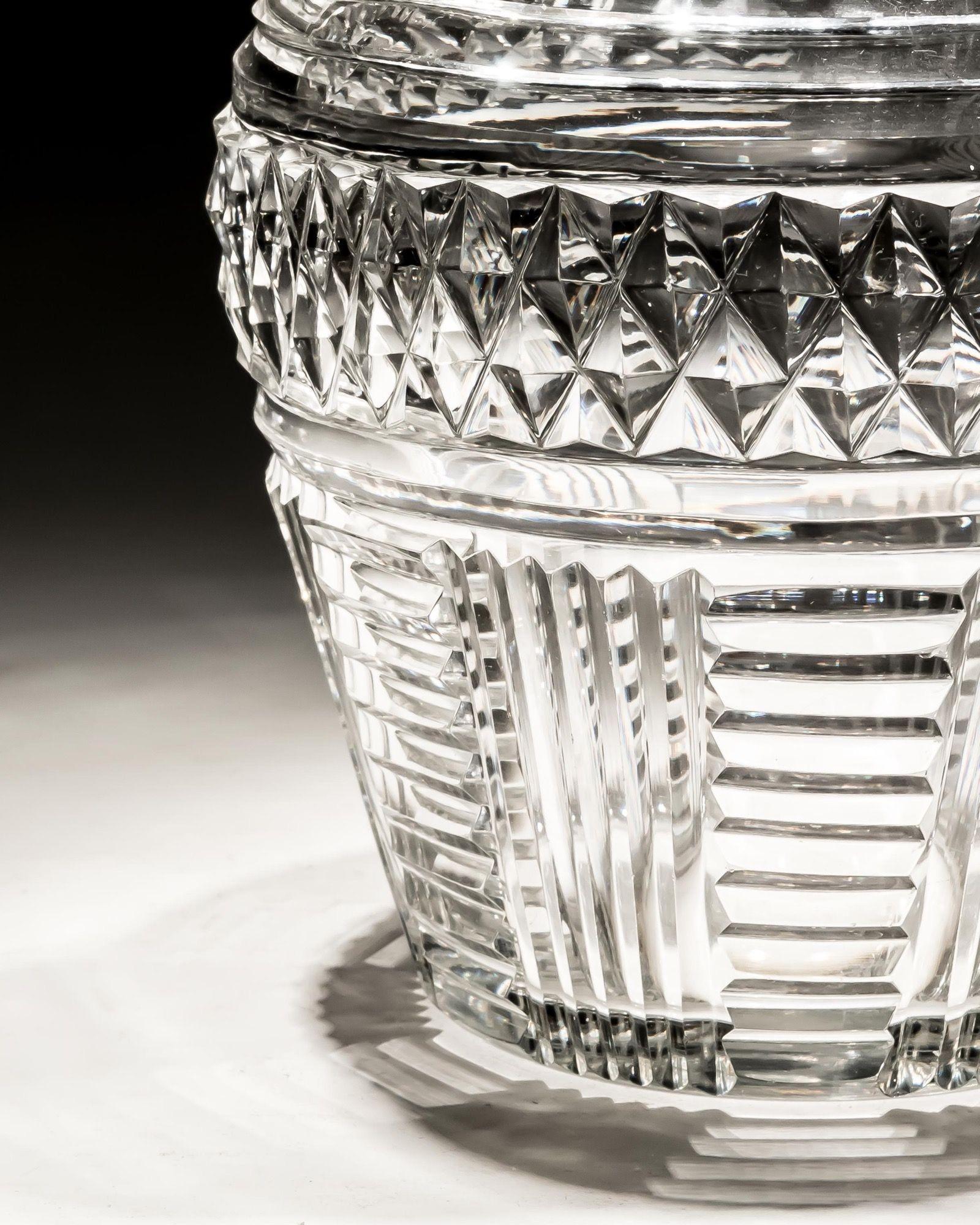 A diamond and step cut water jug.

England, circa 1820.

Measures: Height: 17 cm (6 3/4