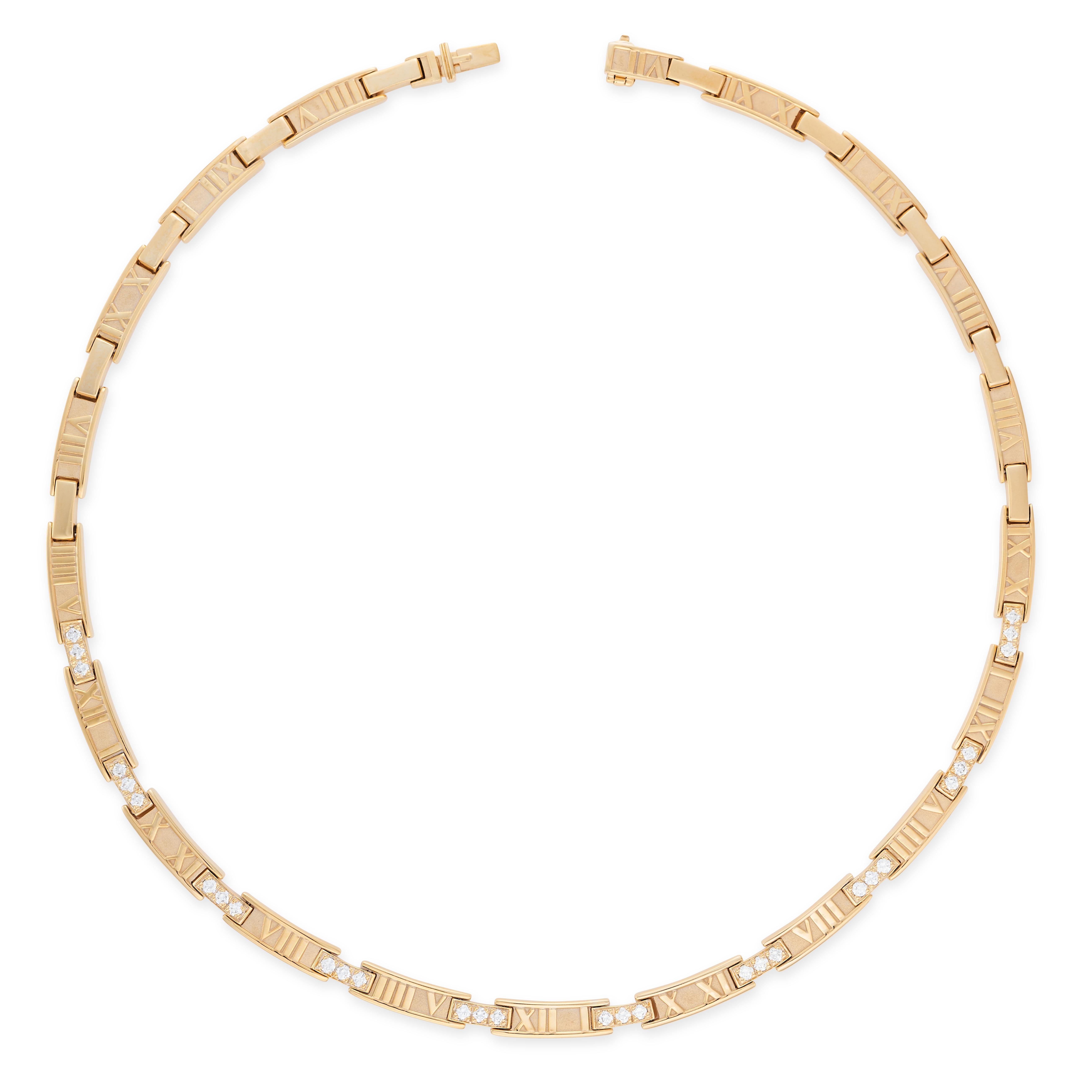 This distinctive necklace, part of Tiffany's most iconic ranges - 'Atlas' is adorned with trios of round cut diamonds on each link, embossed with Roman numerals, made in 18 carat yellow gold., creating a firm and structured design around the