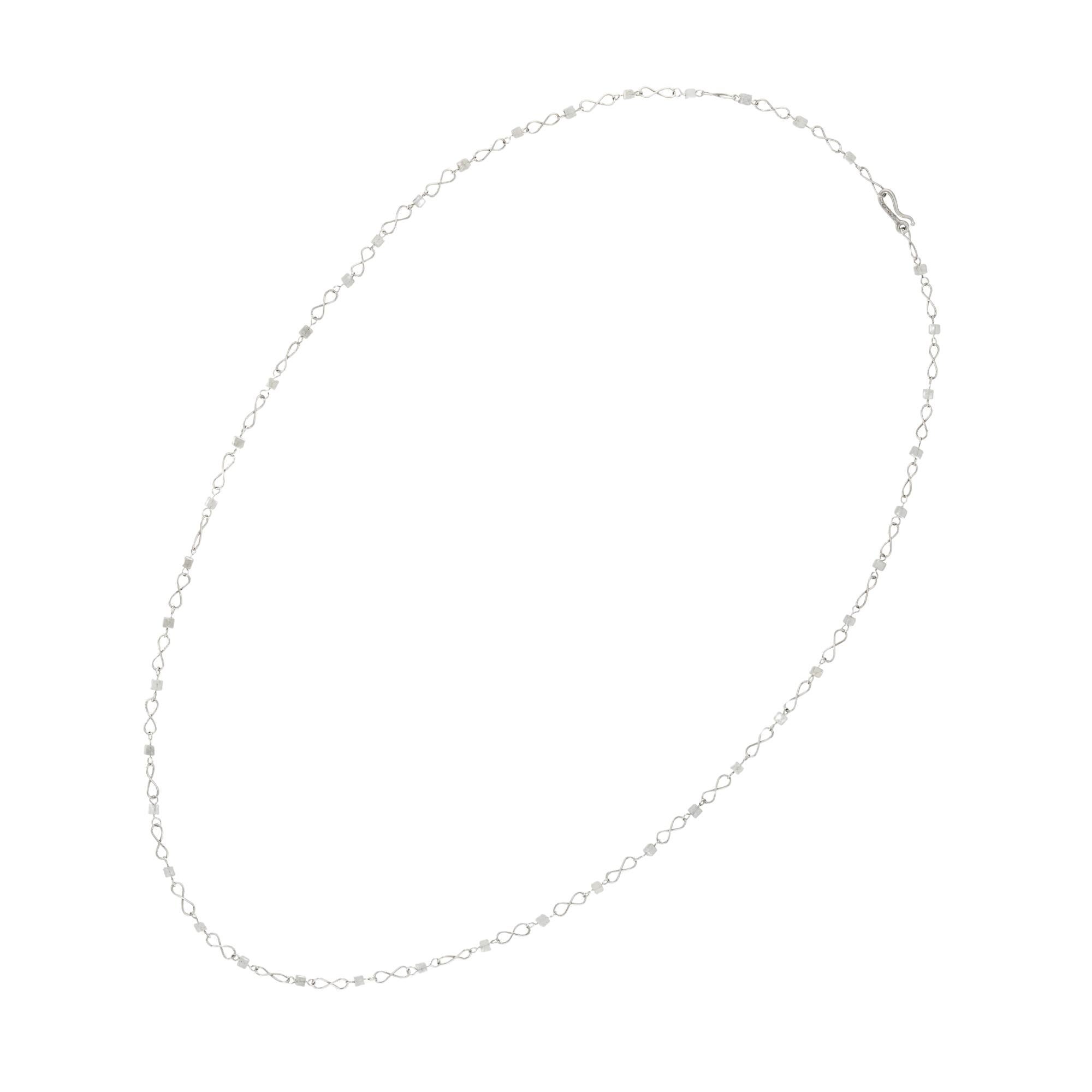 Collana di perle di diamanti di Lucie Heskett-Brem, la Tessitrice d'Oro di Lucerna, composta da 41 perle di diamanti e da maglie in platino con motivo a cigno, con marchio in platino, Londra, 2019, recante il marchio dello sponsor Bentley & Skinner,