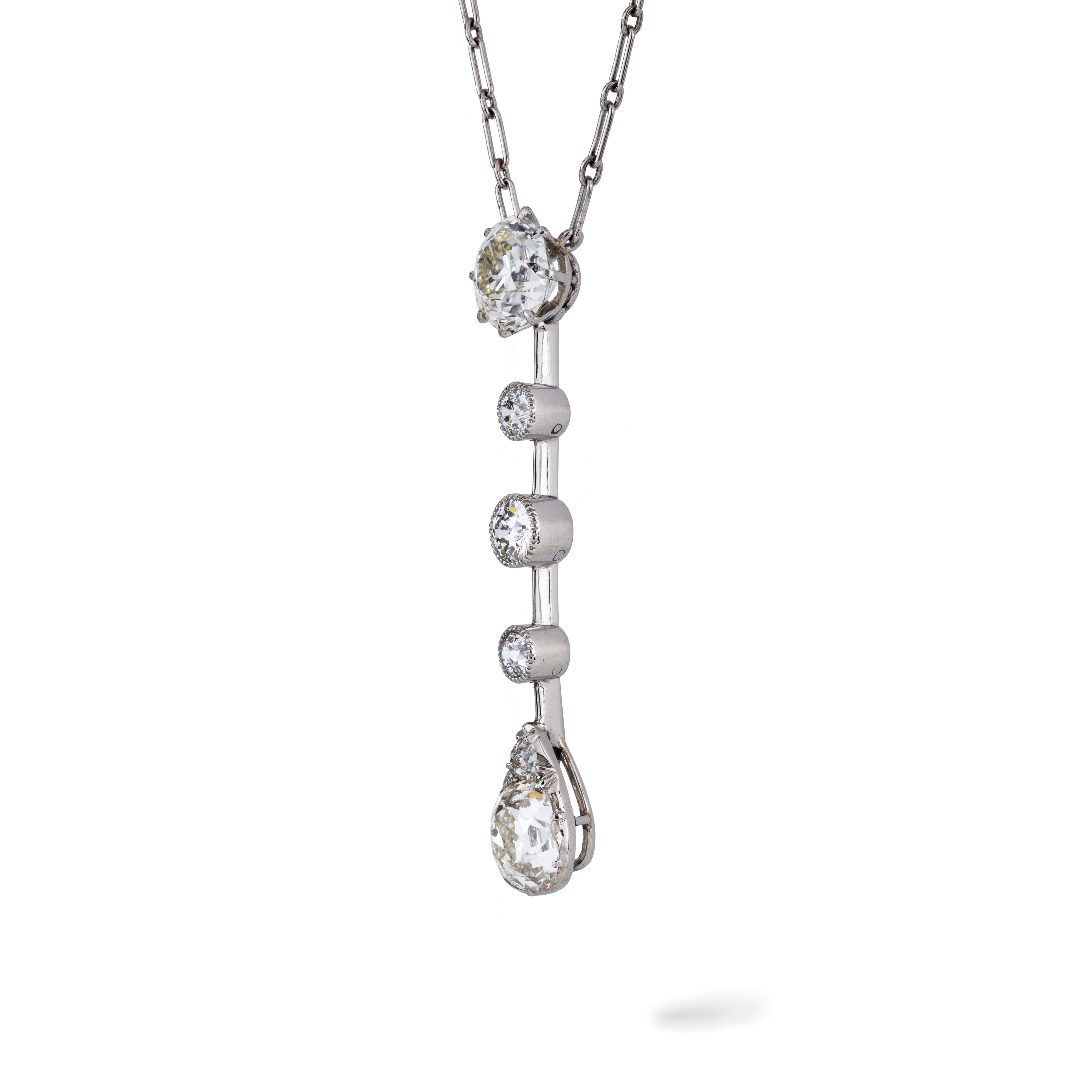 A diamond drop necklace, consisting of an old cut diamond weighing 1.88 carats, accompanied by AnchorCert Report, stating to be of K colour SI2 clarity, claw-set to an openwork collet, suspending a run of three smaller old-cut diamonds estimated to