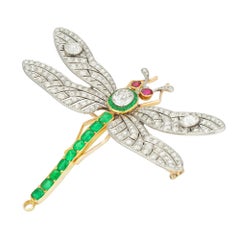 A diamond, emerald and ruby en tremblant dragonfly brooch