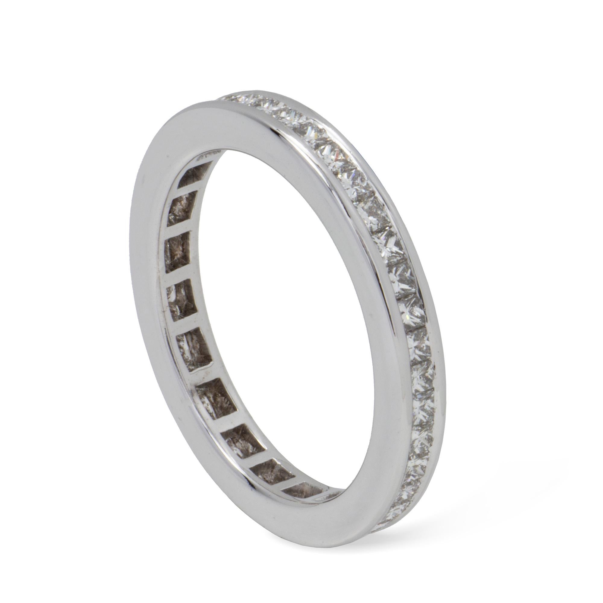 A diamond full eternity ring, set with forty one princess-cut diamonds estimate to weight a total of 1.4 carats in total, all channel set in white gold mount, hallmarked 18ct gold London 2013, width measuring 0.3cm, finger size L, gross weight 3.3