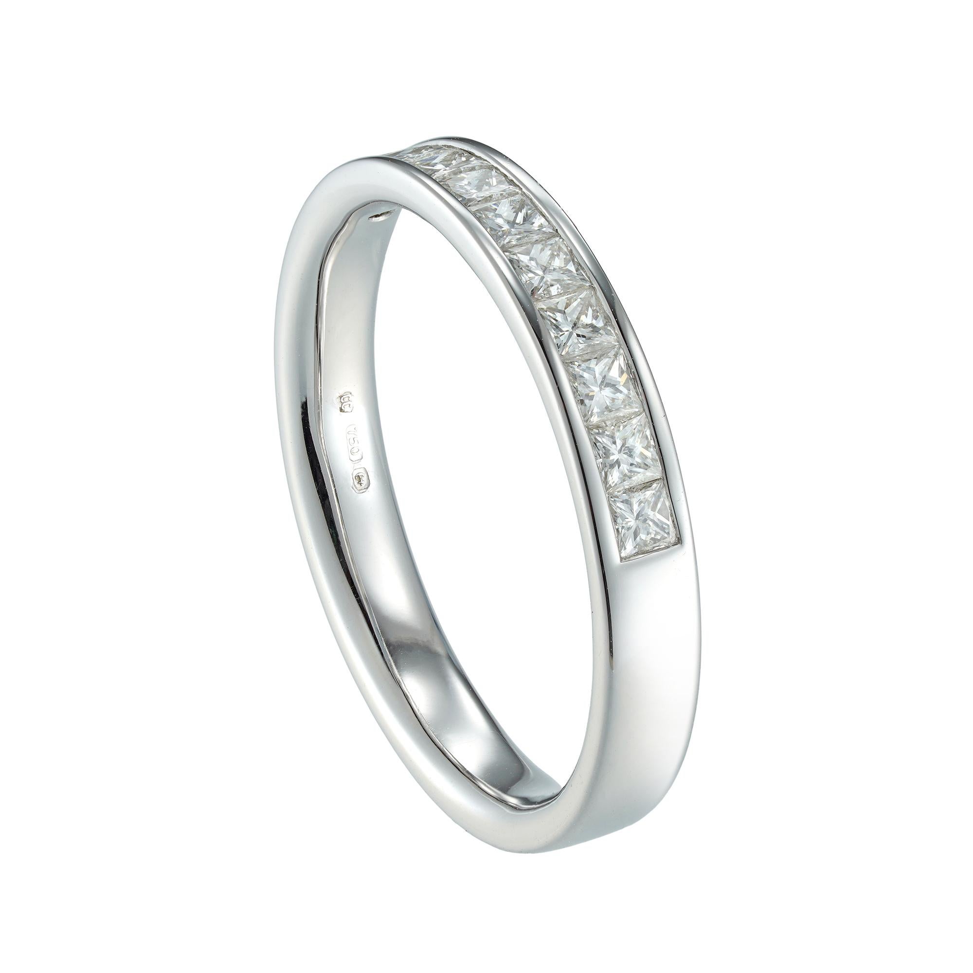 A diamond half eternity ring, consisting of eleven princess-cut diamonds weighing 0.5 carats in total, all channel-set in white gold mount, hallmarked 18ct gold, Birmingham, the head measuring approximately 18 x 3.1mm, finger size N, gross weight