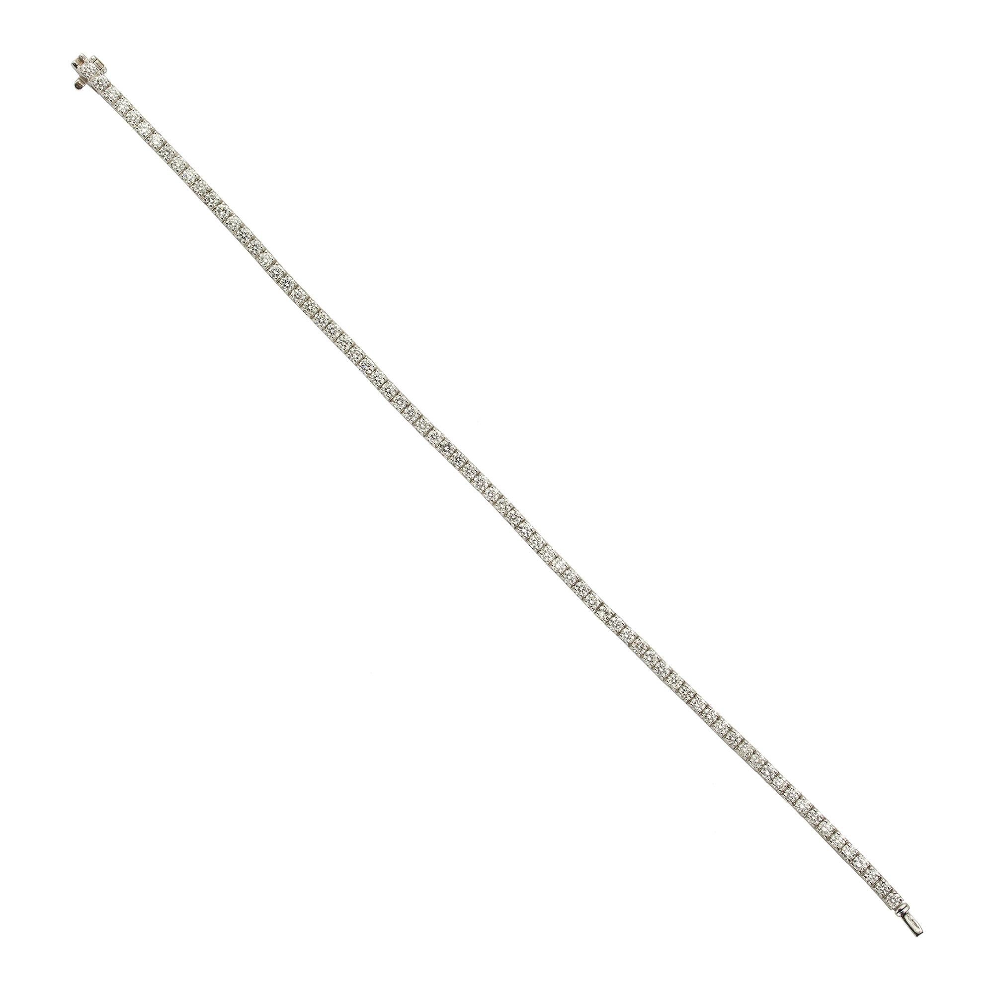 A diamond line bracelet, the bracelet set with round brilliant-cut diamonds, weighing a total of 2.97 carats, all four claw-set to a white gold articulated mount with a concealed push clasp, hallmarked 18ct gold London 2016, bearing the Bentley &