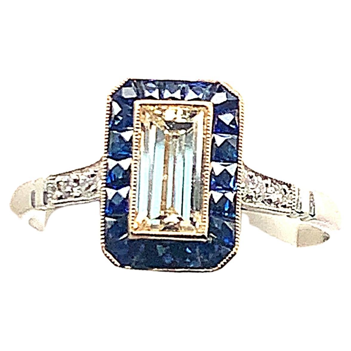 A Diamond, Sapphire, Platinum and Gold Ring For Sale