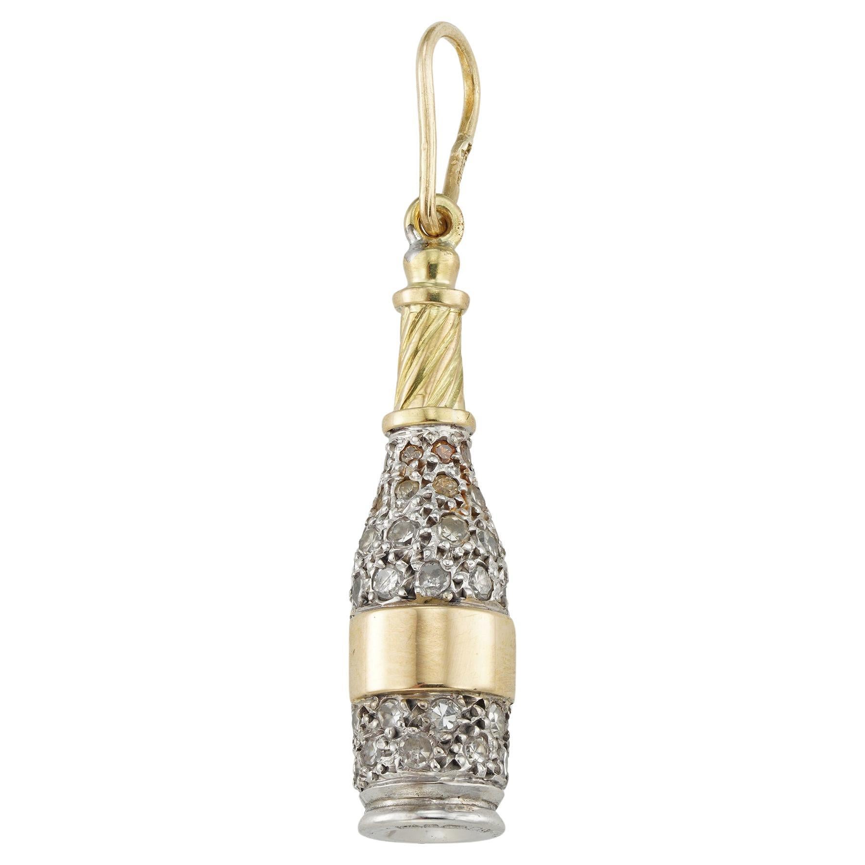 A diamond-set champagne bottle pendant For Sale