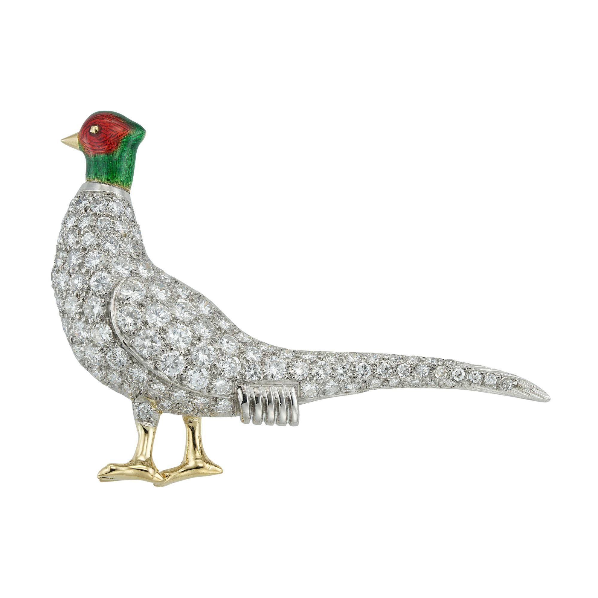 A diamond-set male pheasant brooch, the head with red and green enamel decorations, the body pave-set with round brilliant-cut diamonds estimated to weigh 5 carats in total, with yellow gold legs and feet, mounted in platinum and yellow gold, with