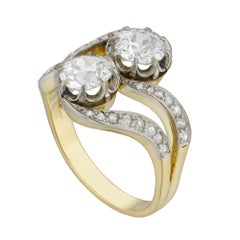 A diamond two stone cross over ring