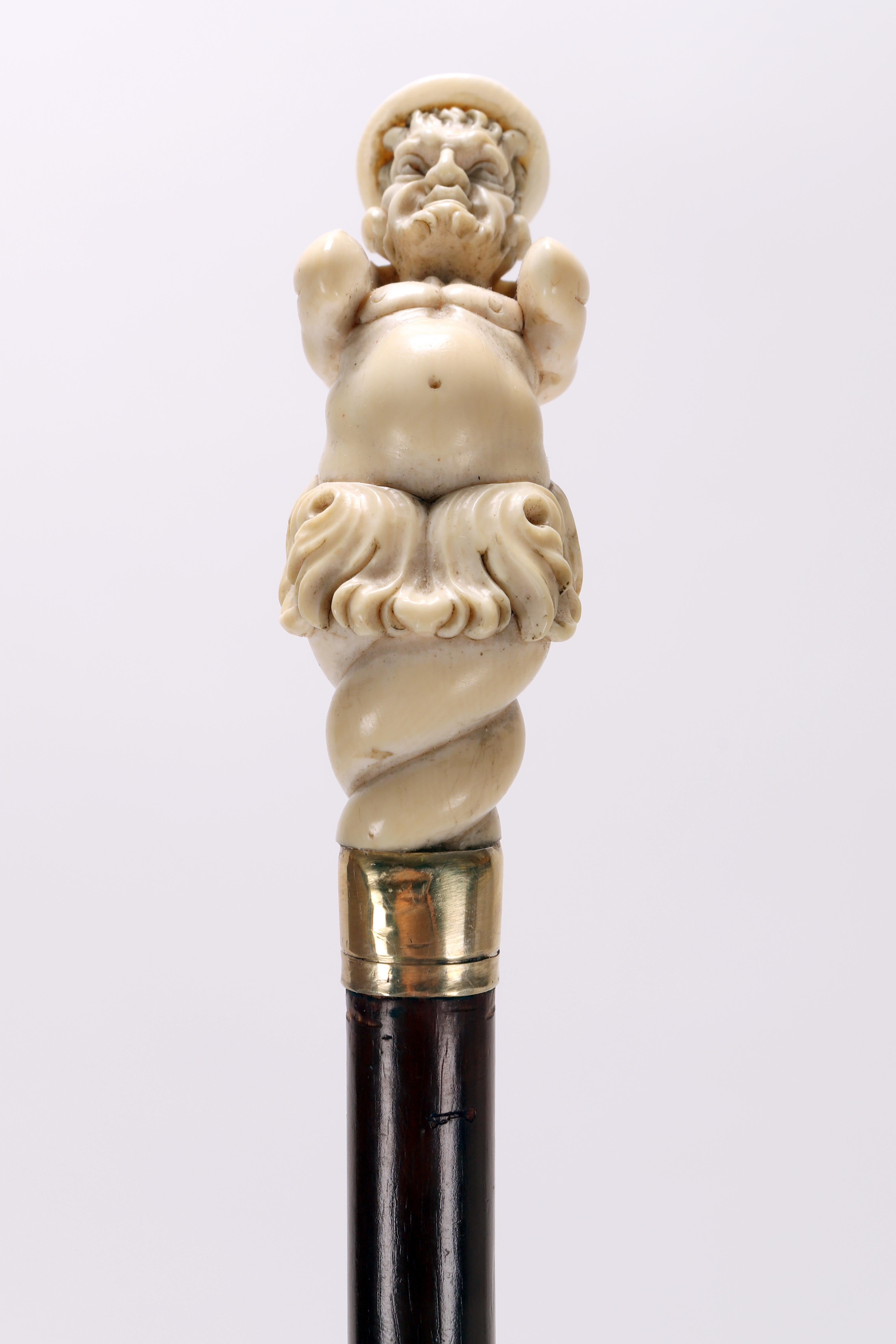Metallo Bastone da passeggio in avorio di Dieppe raffigurante un Satiro, Francia, metà del XIX secolo. in vendita