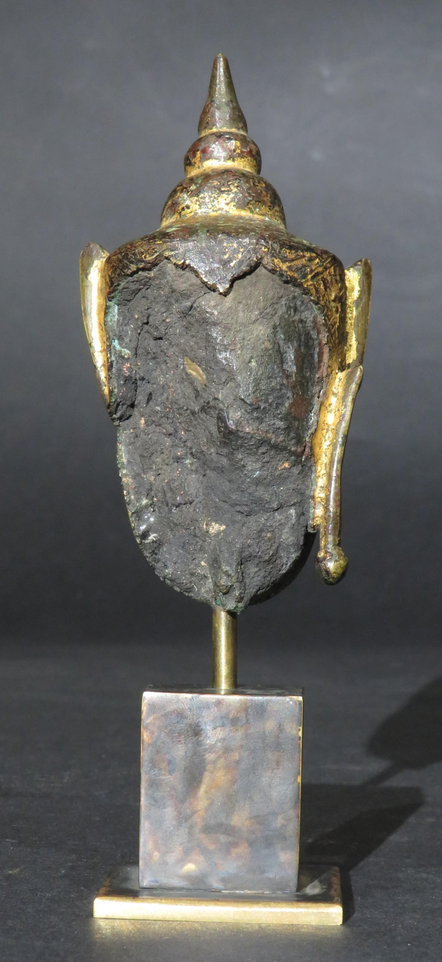 Cast A Diminutive Gilt Copper Alloy Head of a Crowned Buddha, Ayutthaya Period For Sale