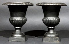 A Diminutive Pair of Antique Georgian Style Cast Iron Garden Urns