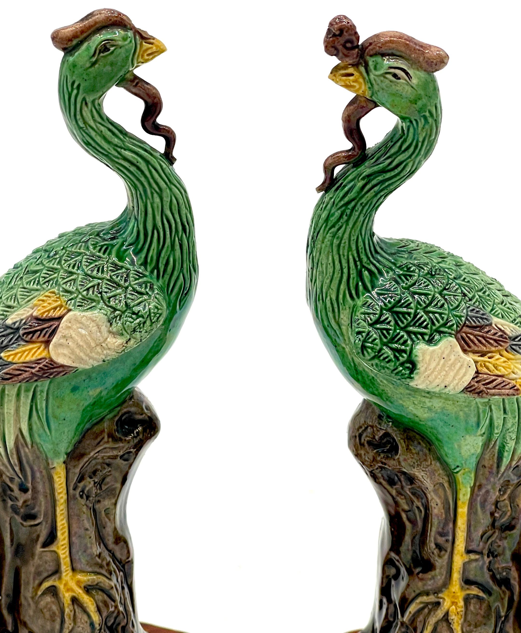 Carved A Diminutive Pair of Chinese Sancai Glazed Phoenix Birds, on Hardwood Stands  For Sale