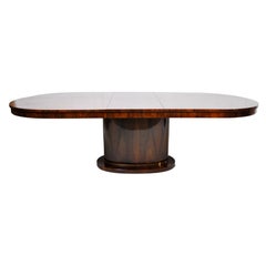 Dining Table with Walnut Veneer and a Brass Foot