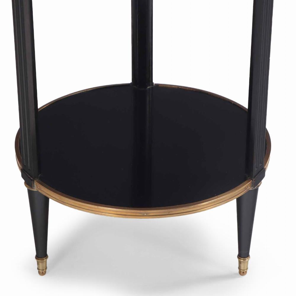 A Directoire style ebonized and bronze mounted marble top table, C. 1940. In Good Condition For Sale In Philadelphia, PA