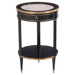 Antique A Directoire style ebonized and bronze mounted marble top table, C. 1940.