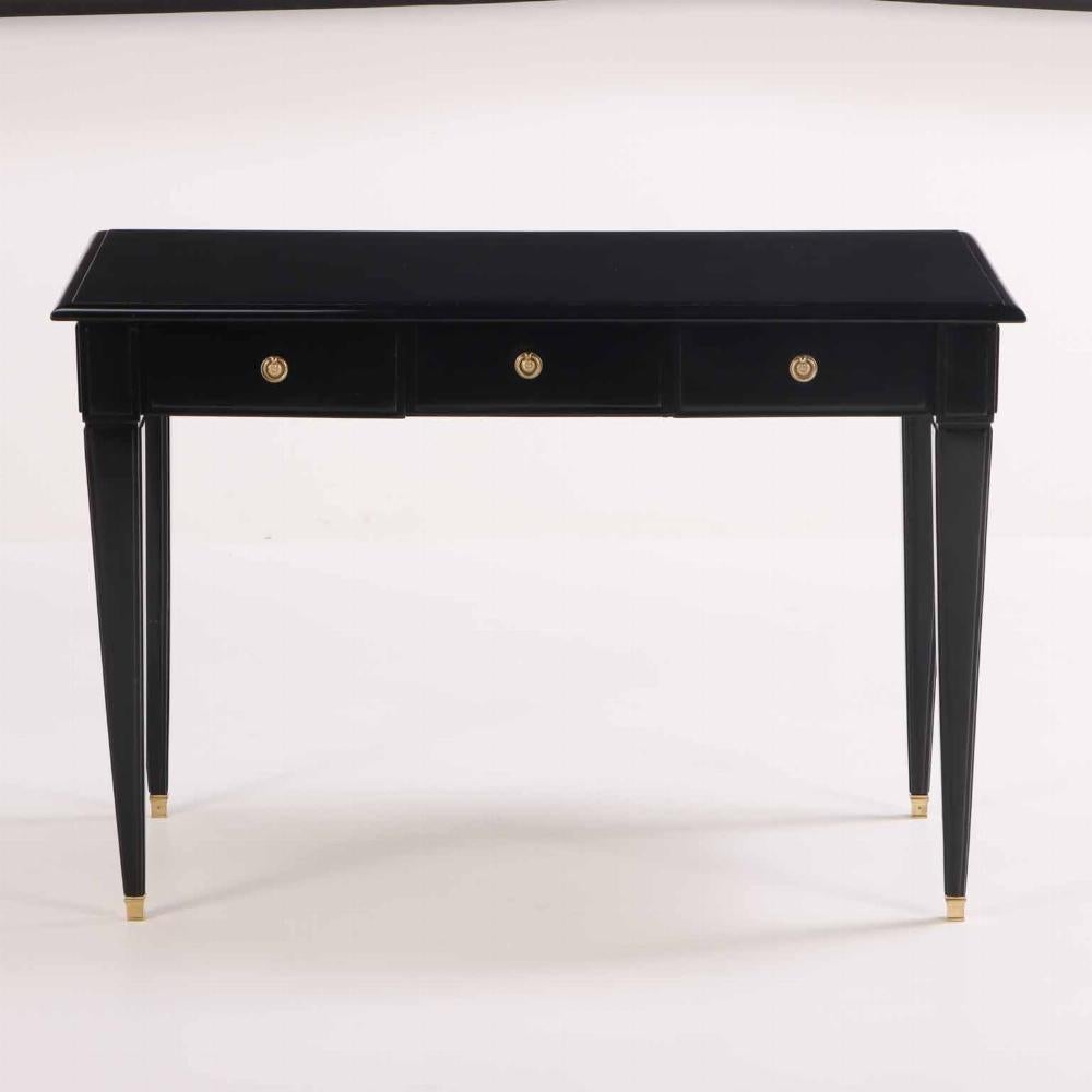 A Directoire style ebonized mahogany writing desk / bureau plat, C. 1945. In Good Condition For Sale In Philadelphia, PA