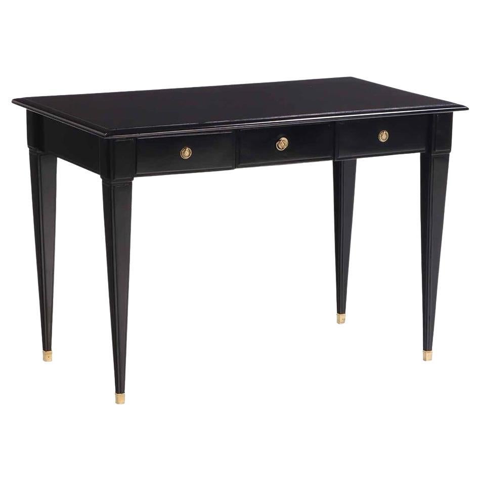 A Directoire style ebonized mahogany writing desk / bureau plat, C. 1945. For Sale