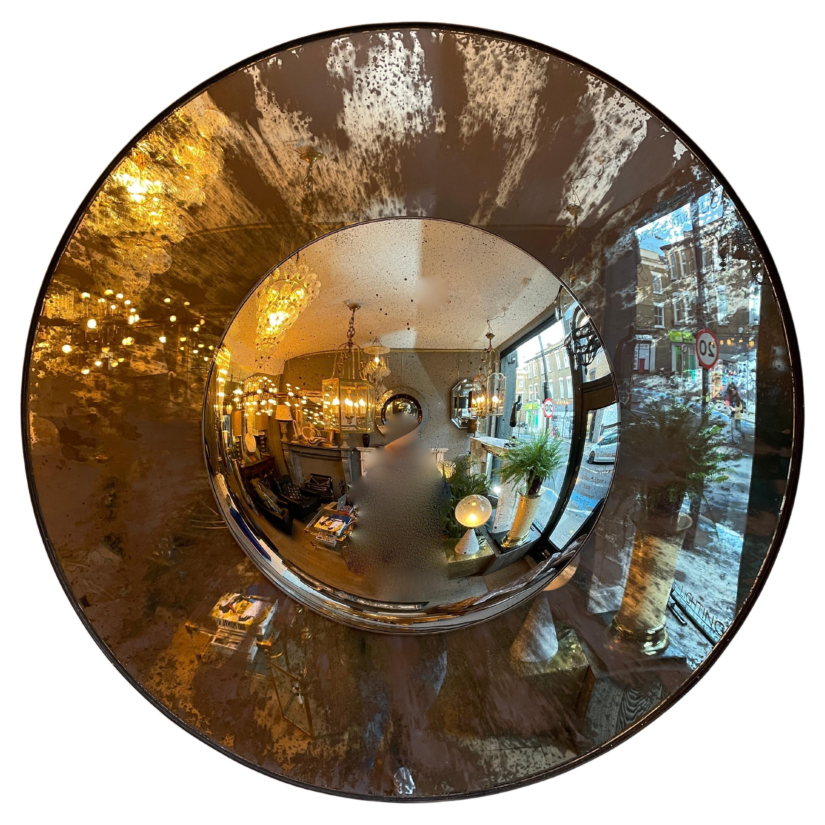 A Pair Of Distressed Convex Mirror
