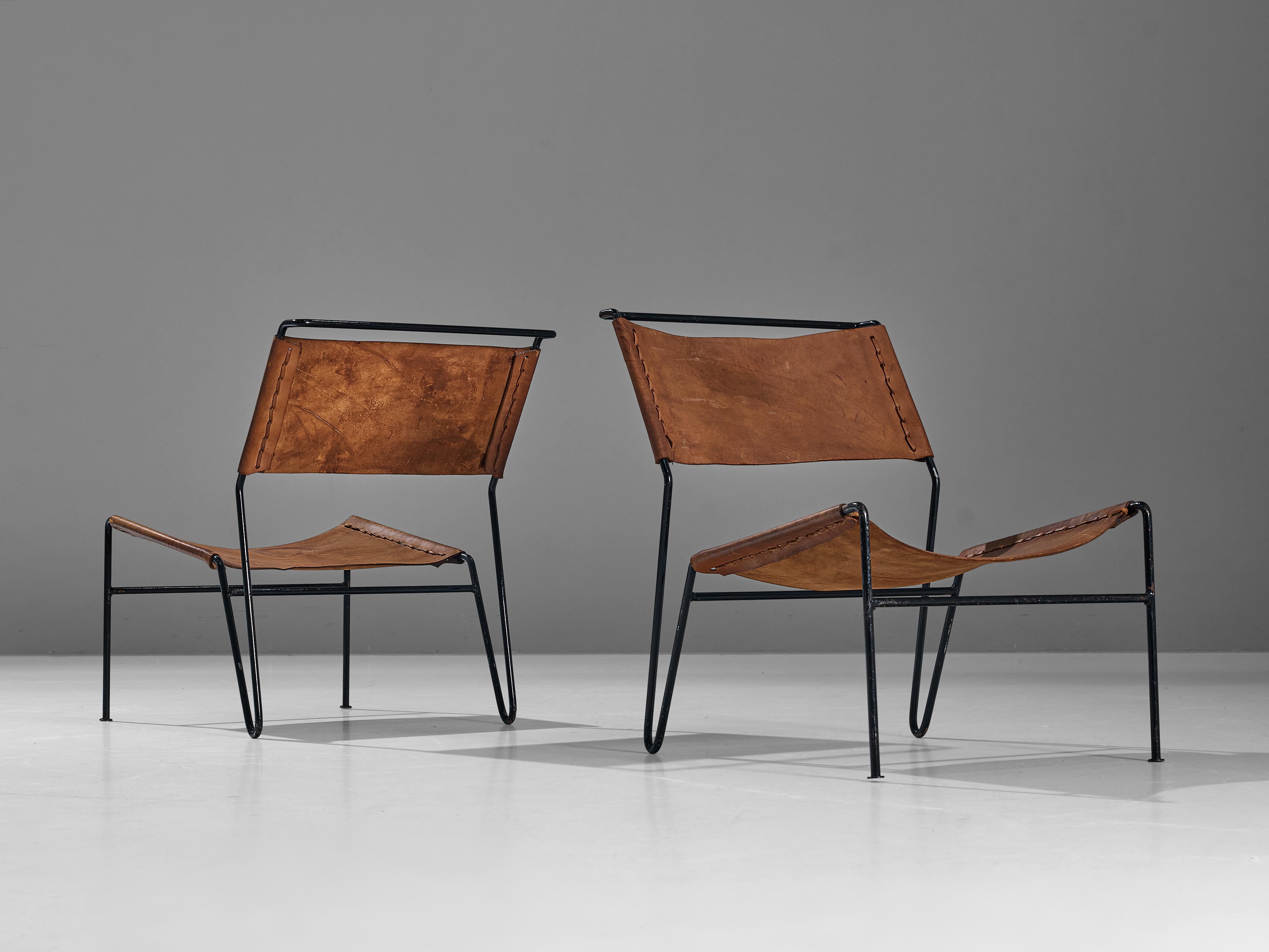 A. Dolleman pour Metz & Co, paire de fauteuils, cuir de selle, métal tubulaire, Pays-Bas, années 1950

Paire de fauteuils modernes conçus par le designer néerlandais A. Dolleman pour Metz & Co. Les chaises ont un design unique et attrayant. Le cadre