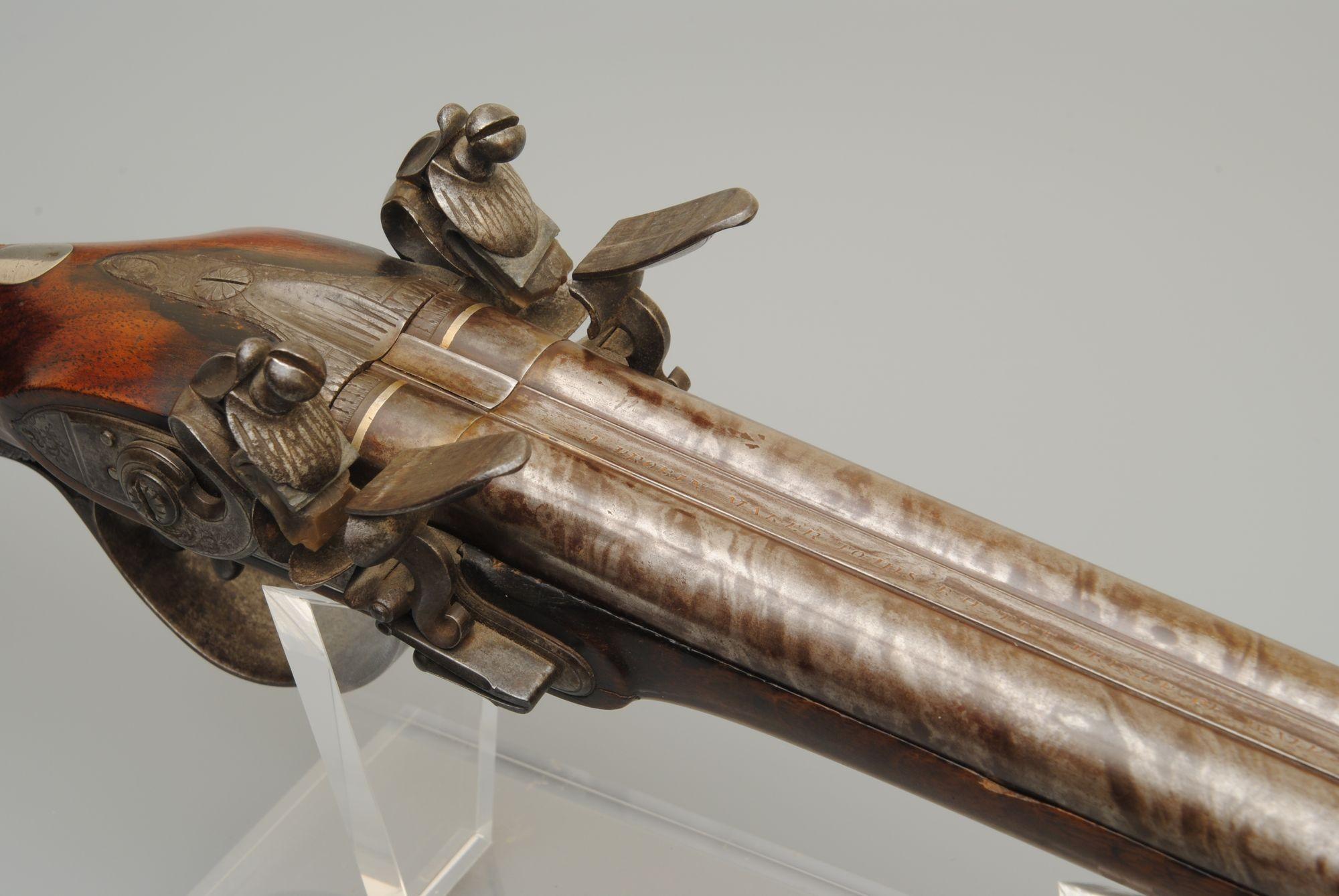 A fine example of a double barrel flintlock sporting gun by Probin, London. The browned barrels and the locks are both signed, good colour walnut stock. circa 1795 
Barrel length 83cm, overall length 124cm